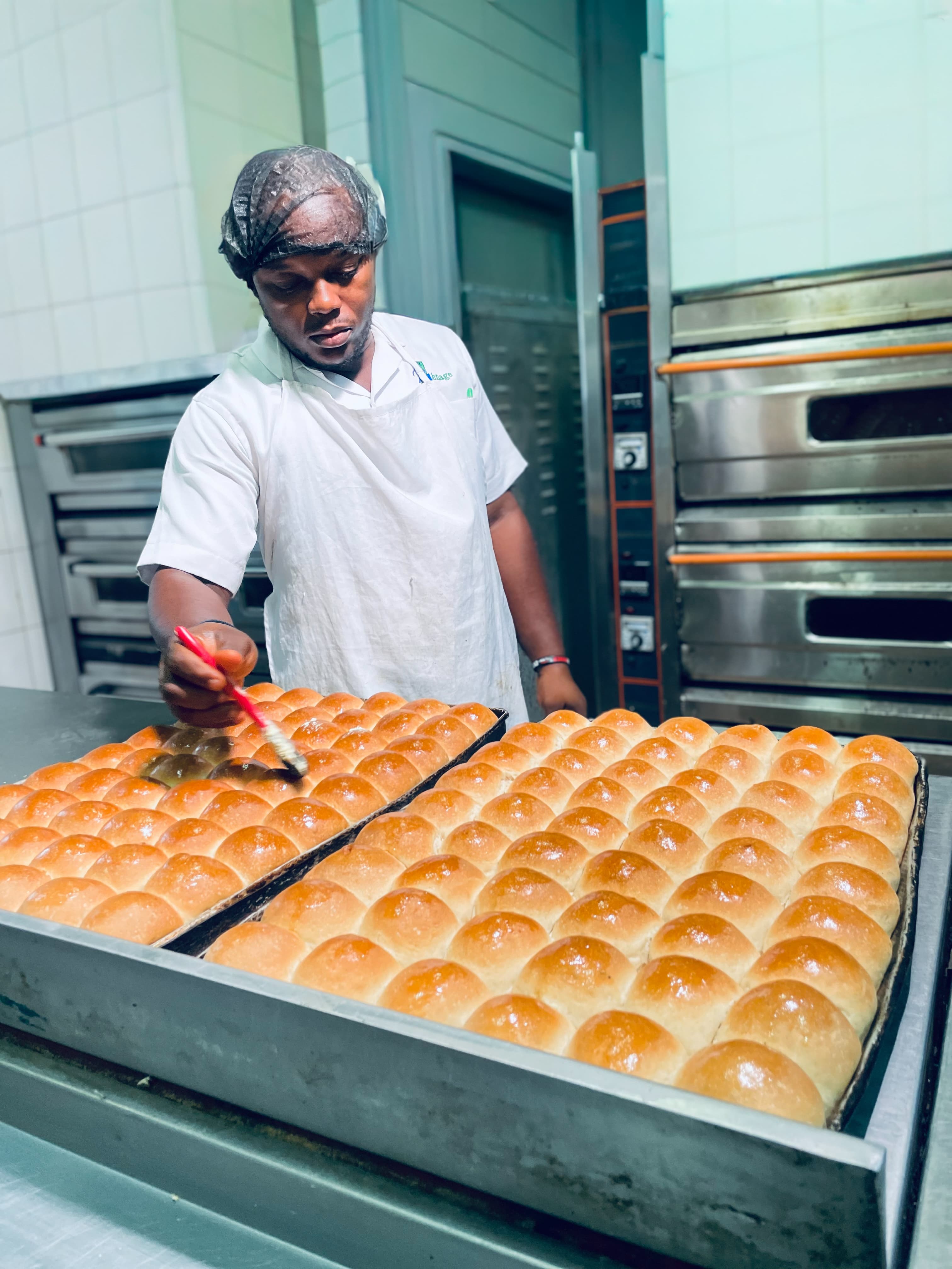 Baker preparing fresh bread